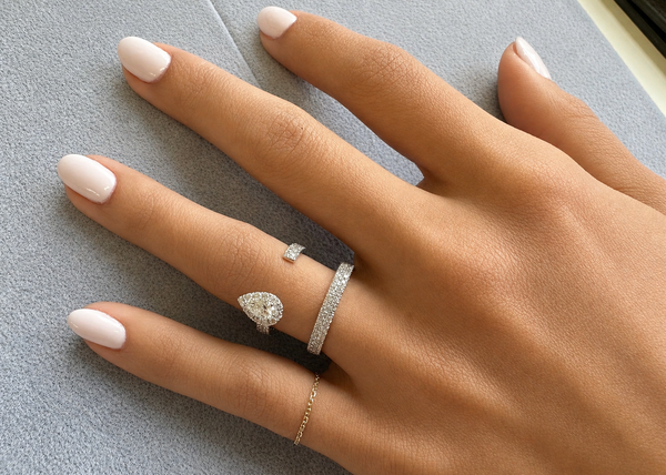 Ring 18kt Gold Open Pear and Round Diamonds